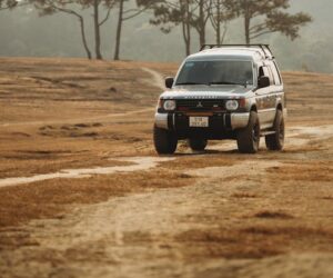 4WD SUV on dirt road in Africa