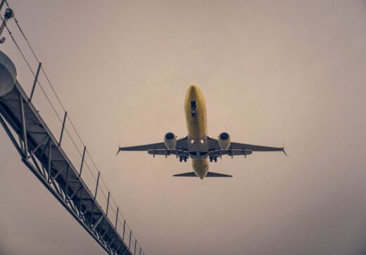 Airplane flying in blue sky
