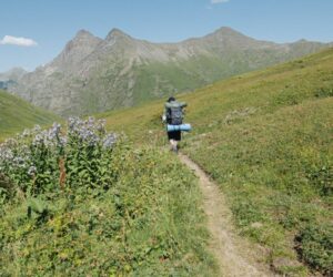 Traveler with backpack hiking in Madagascar