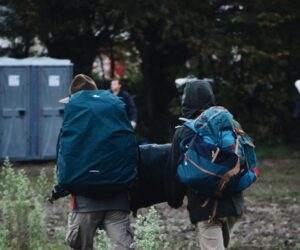 Hikers with backpacks on a forest trail — Madagascar adventure route