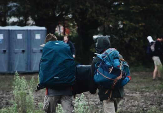 Hikers with backpacks on a forest trail — Madagascar adventure route