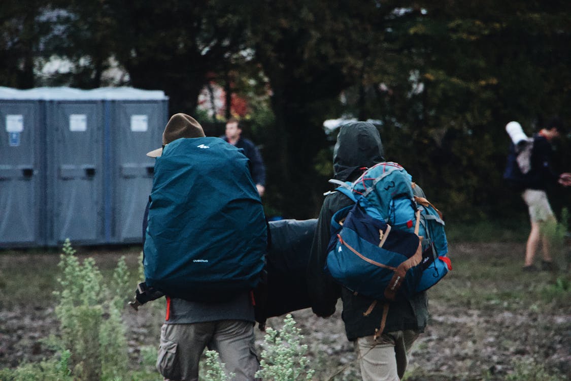 Hikers with backpacks on a forest trail — Madagascar adventure route