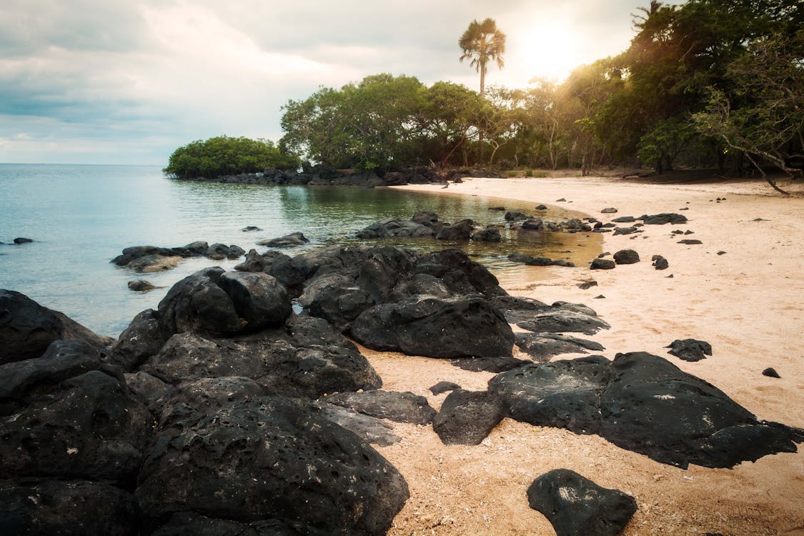 Madagascar street food vendor selling traditional snacks at a local market