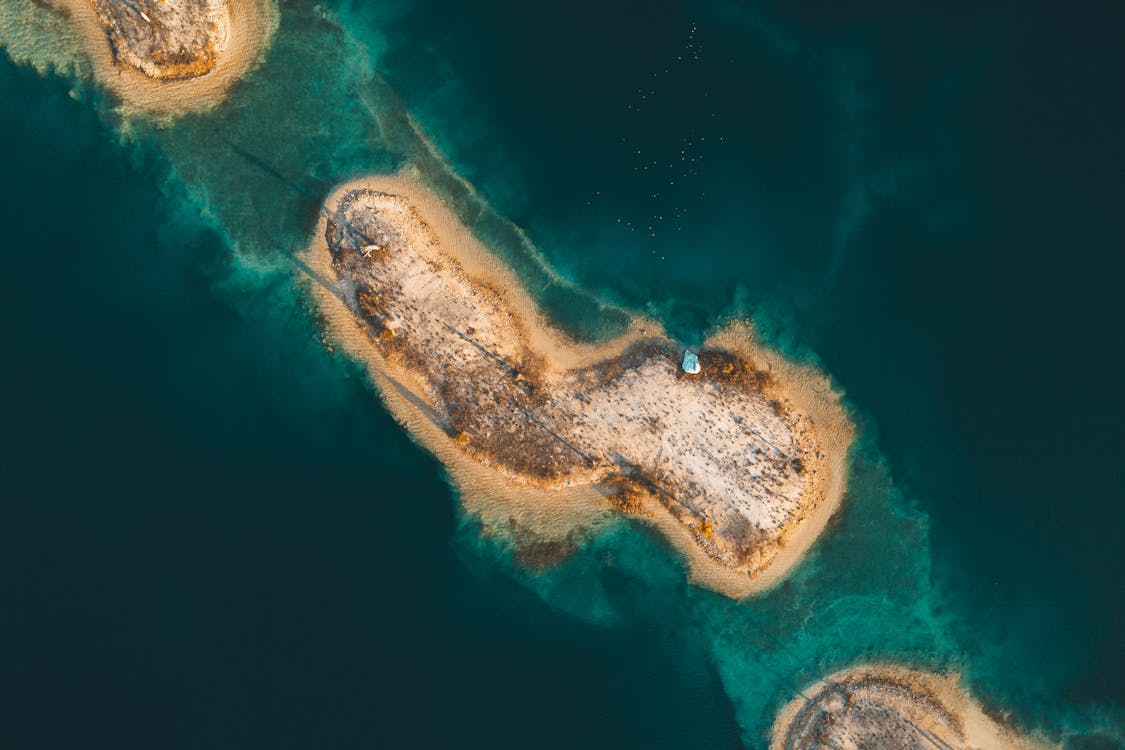 Aerial view of tropical islands surrounded by turquoise water