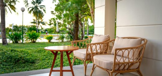 Cozy guesthouse patio with rattan chairs and tropical garden Antananarivo