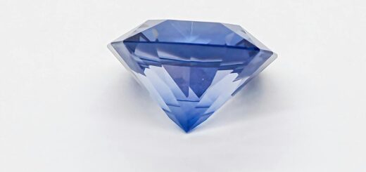 Madagascar sapphire — A stunning blue sapphire gemstone capturing light beautifully on a clean white background.