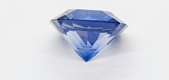Madagascar sapphire — A stunning blue sapphire gemstone capturing light beautifully on a clean white background.