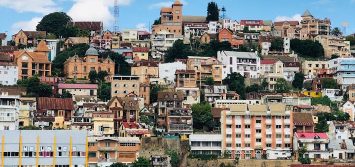 Antananarivo cityscape, Madagascar — colorful buildings under a bright blue sky