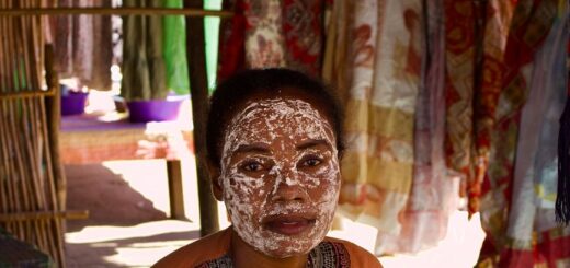 A Malagasy woman at a market stall, Madagascar